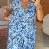Ellie - Elegant Floral V-Neck Pleated Hem Dress