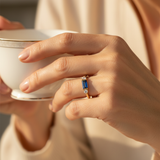 Gold Ring with Stunning Blue Centre Stone and Sparkle