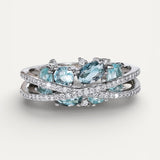 Silver Cross Ring with Blue Gemstone