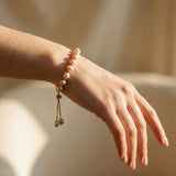 Gold Bracelet with Pink Pearls