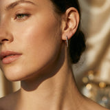 Elegant Gold Earrings with Cross